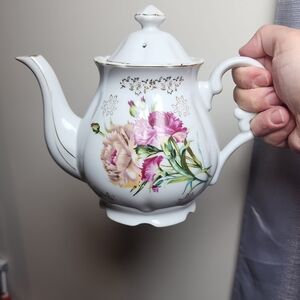 Elegant White Teapot with Floral Design